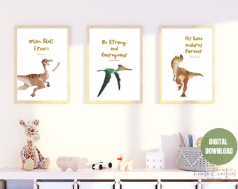 May include: Three printable wall art prints featuring dinosaur illustrations and bible verses. The prints are in a light wood frame and have a white background. The verses are "Whom Shall I Fear?"  "Be Strong and Courageous" and "His Love Endures Forever".
