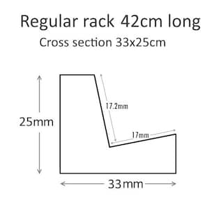 May include: Diagram of a regular rack that is 42 cm long. The cross section of the rack is 33 cm by 25 cm. The diagram shows the dimensions of the rack's cross section.