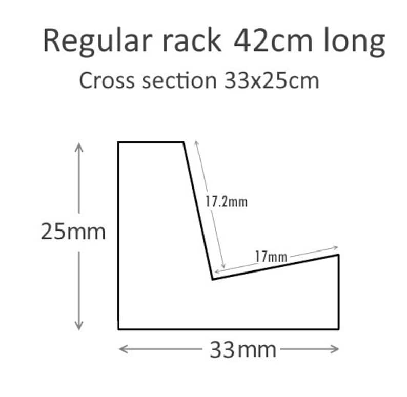 May include: Diagram of a regular rack that is 42 cm long. The cross section of the rack is 33 cm by 25 cm. The diagram shows the dimensions of the rack's cross section.