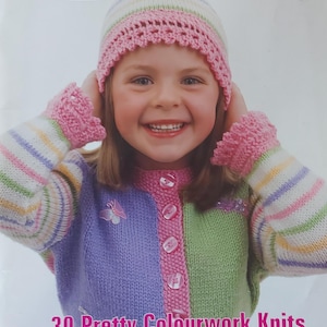 May include: A colorful knit cardigan with a striped pattern and buttons. The cardigan is worn by a young girl wearing a pink and white striped hat. The text on the cover reads "30 Pretty Colourwork Knits for Kids 4 to 10 years".