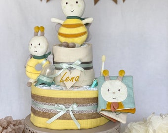 Windeltorte Bienchen in gelb mit Spieluhr, Rassel Biene und Stoffbuch von Fehn für Mädchen  zur Geburt, Babyshower oder Taufe personalisiert