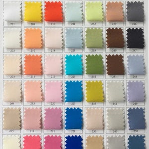 Puede incluir: Carta de muestras de colores con muestras de tela en tonos de blanco, amarillo, naranja, rosa, azul, verde y marr&oacute;n. El texto en la parte inferior dice: "Give New Look To Your Suit By Choosing Different Colour."