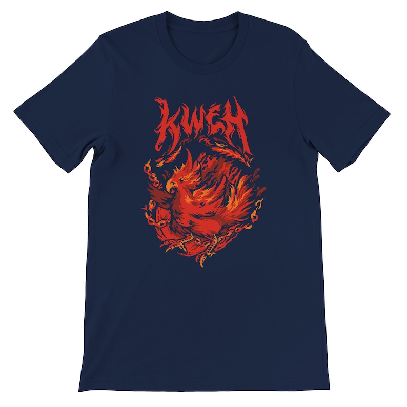 May include: Navy blue t-shirt featuring a fiery red phoenix design with the word "KWEH" above it. The phoenix is encircled by chains and flames, creating a bold graphic.