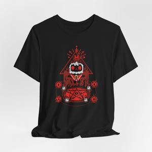 May include: Black t-shirt with a red pixelated design of a cat wearing a crown and a red cape, standing in a pentagram with flames and eyes around it.