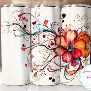 May include: A white tumbler with a colorful floral design. The design features a large red flower with orange and yellow accents, surrounded by swirling vines in shades of blue, red, orange, and brown.