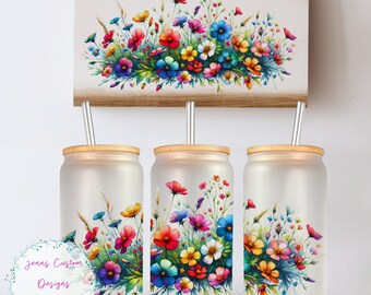 May include: Three frosted glass tumblers with a floral design. Each tumbler has a bamboo lid and a clear reusable straw. The floral design features a variety of colorful flowers, including pink, red, yellow, orange, blue, and purple.
