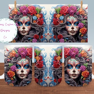 May include: A white ceramic mug with a colorful image of a woman with a sugar skull face surrounded by flowers. The woman has long, dark hair and is wearing a floral crown. The background is a swirling blue and white pattern.