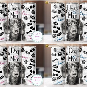 May include: Three sublimation designs for a tumbler featuring a black and white dachshund dog with the text "Doxie Mom" and "Dog Mom" with hearts and paw prints. The designs are on a white background with a wood grain texture.