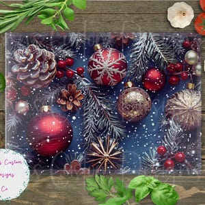 May include: Rectangular cutting board with a Christmas theme. The design features red and gold ornaments, pine cones, and sprigs of evergreen on a blue background. The board has the text "Jenny's Custom Designs Co."