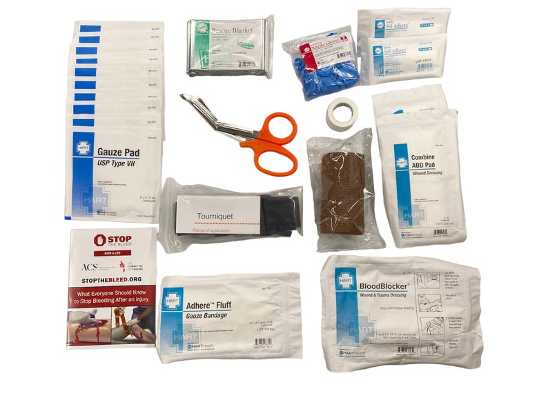 May include: A first aid kit with a variety of supplies, including gauze pads, bandages, a tourniquet, scissors, and gloves. The kit also includes a small pamphlet with instructions on how to stop bleeding.