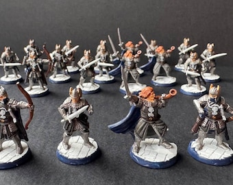 May include: A collection of 18 painted miniature figures, depicting warriors in silver armor with swords and bows. The figures are posed in various battle stances and are set on round bases.
