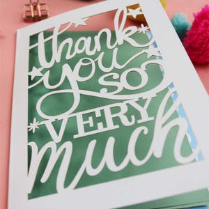 A Cricut card SVG. Card says Thank you so very much with stars