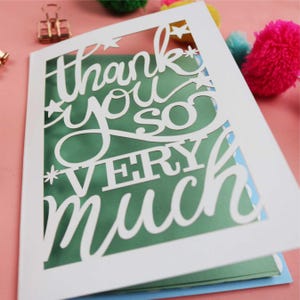 A Cricut card SVG. Card says Thank you so very much with stars