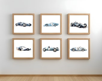 May include: Six framed watercolor paintings of vintage race cars. The cars are all blue and white and have different numbers on them. The frames are all wooden and have a light brown finish.