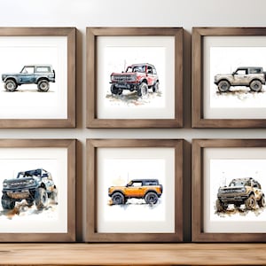 May include: Six framed watercolour prints of classic SUVs in shades of blue, red, and yellow. Each print showcases a detailed illustration of the vehicle with a watercolour effect, set against a white backdrop within a wooden frame.