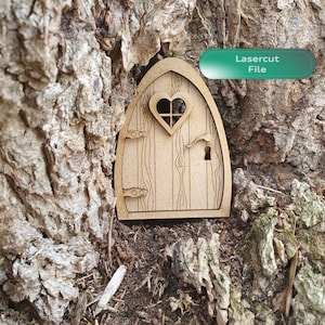 May include: A laser cut wooden door with a heart-shaped window and a keyhole. The door is designed to look like a fairy door and is perfect for adding a touch of whimsy to your home decor.