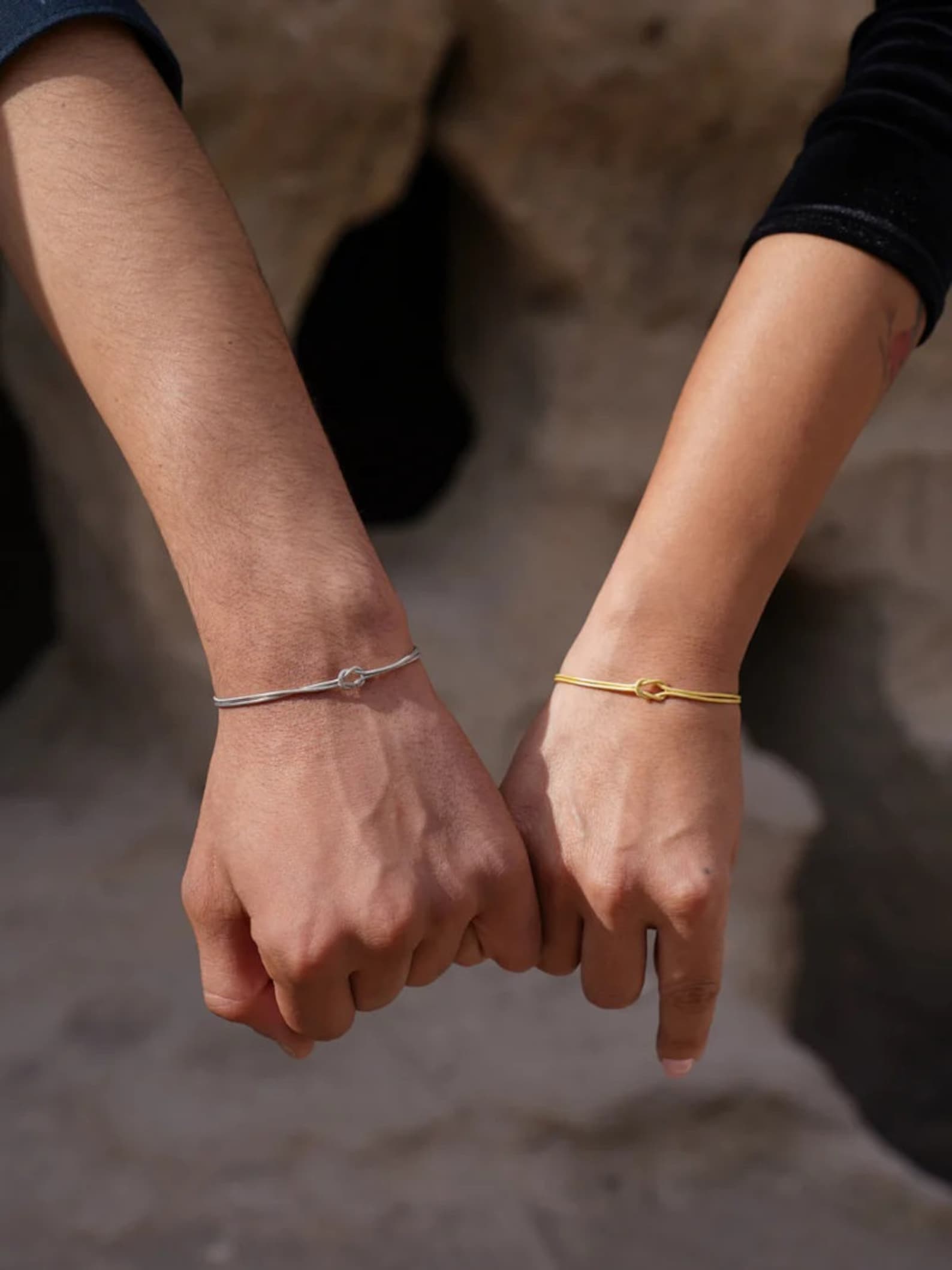 couple with matching bracelets