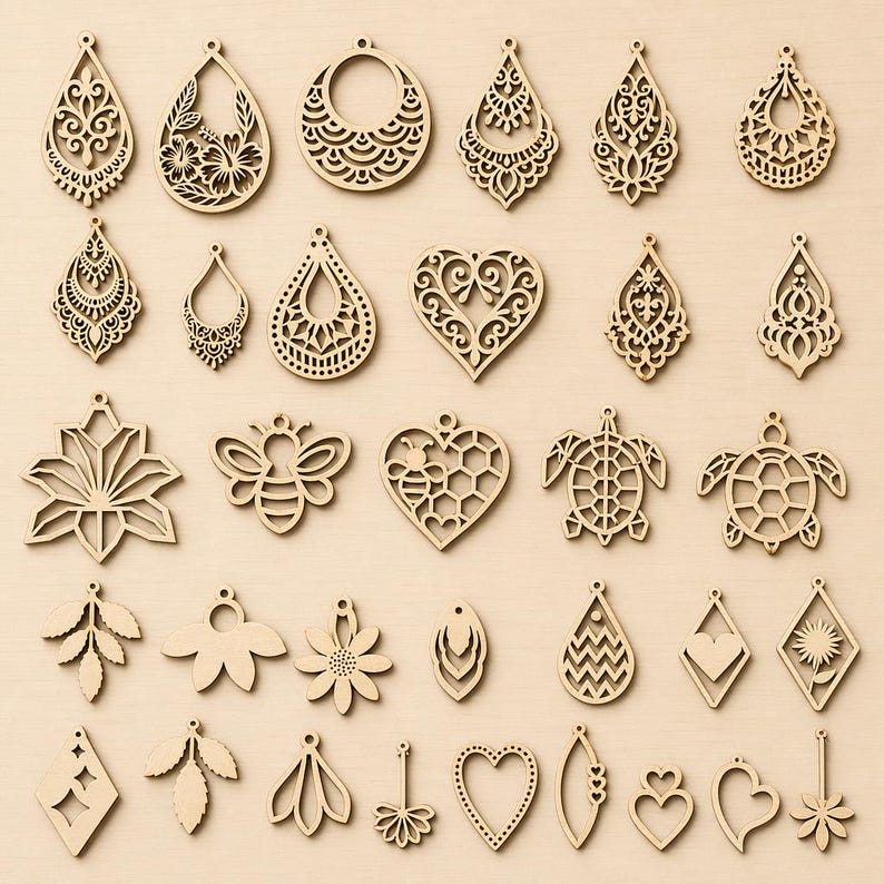 May include: A collection of thirty-four light brown wooden laser-cut pendants in various shapes including teardrops, hearts, flowers, a bee, and turtles. Each piece features intricate cut-out patterns and a small hole at the top for hanging.