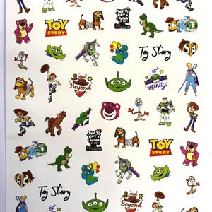 May include: Sheet of colorful Toy Story stickers featuring various characters like Woody, Buzz Lightyear, and aliens. The sheet includes the Toy Story logo and phrases like "You've Got a Friend in Me" and "To Infinity and Beyond."