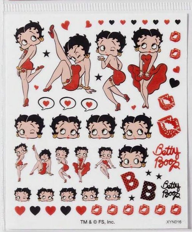 May include: Sheet of Betty Boop stickers. The stickers feature the cartoon character in various poses, wearing a red dress, alongside hearts, lips, and the text "Betty Boop". The background is white.