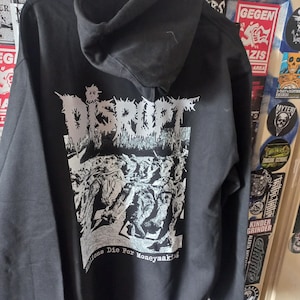 Disrupt - Miljontals människor dör för pengar, merchandise, crust, punk, dragkedja med huva, svart och vitt
