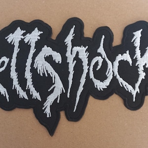 May include: Black and white embroidered patch with the word "HellShock" in a stylized font.