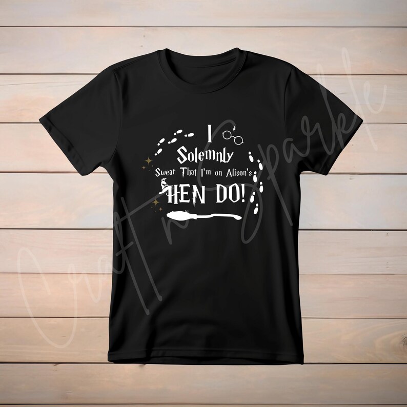 May include: Black t-shirt with white text that reads "I Solemnly Swear That I'm on Alison's Hen Do!" with a graphic of a broom, glasses, and footprints.