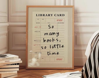 May include: A framed print of a library card with the text "So many books. So little time." The card has a date due and date returned section with dates filled in.