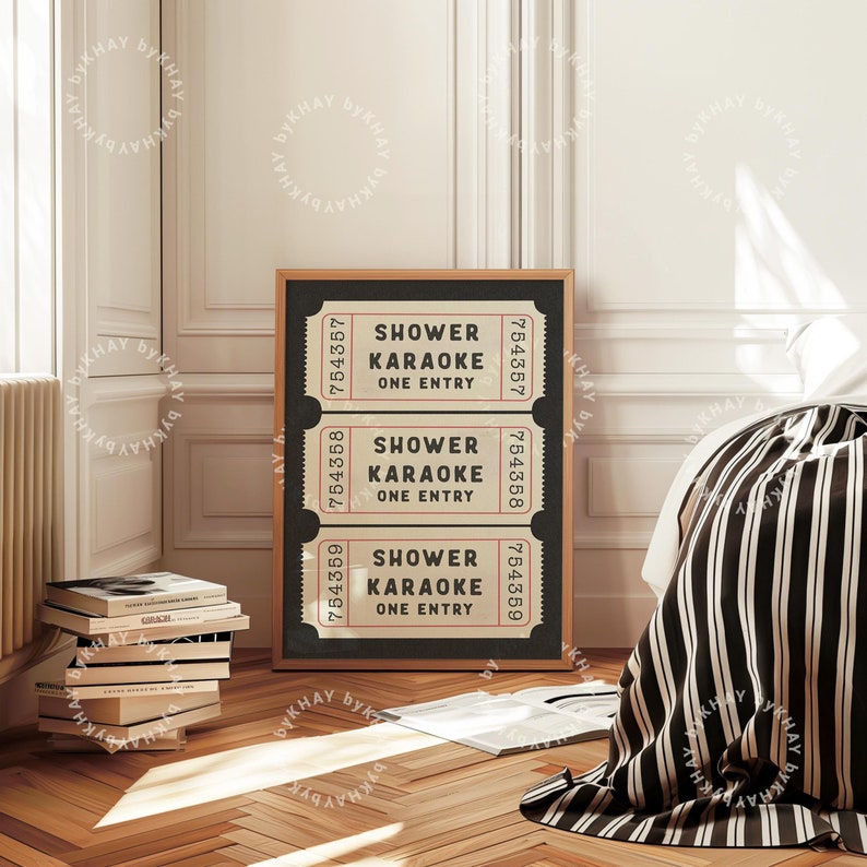 May include: A black and white printable wall art design featuring three vintage-style tickets with the text "Shower Karaoke One Entry" repeated on each ticket.