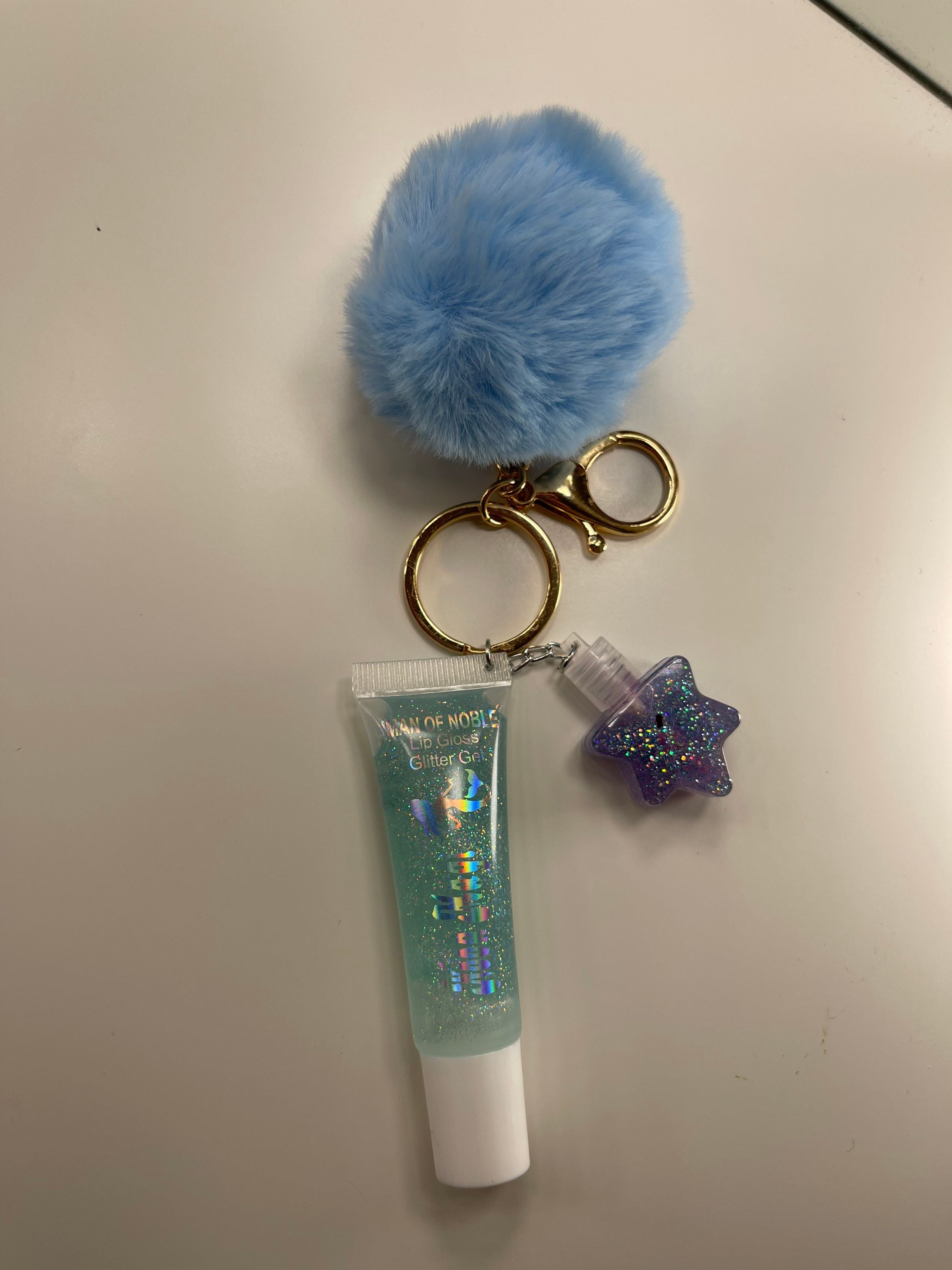Source ZH3081 Mini soft tube lip gloss keychain kit with cute colored  pompon on m.