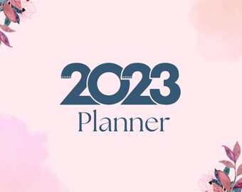 May include: A pink and blue floral design with watercolor flowers and leaves. The text "2023 Planner" is in the center of the image.