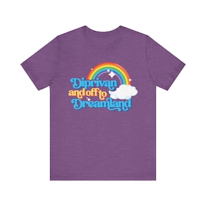 May include: Purple t-shirt featuring a rainbow, cloud, and the text "Diprivan and off to Dreamland" in a retro font.