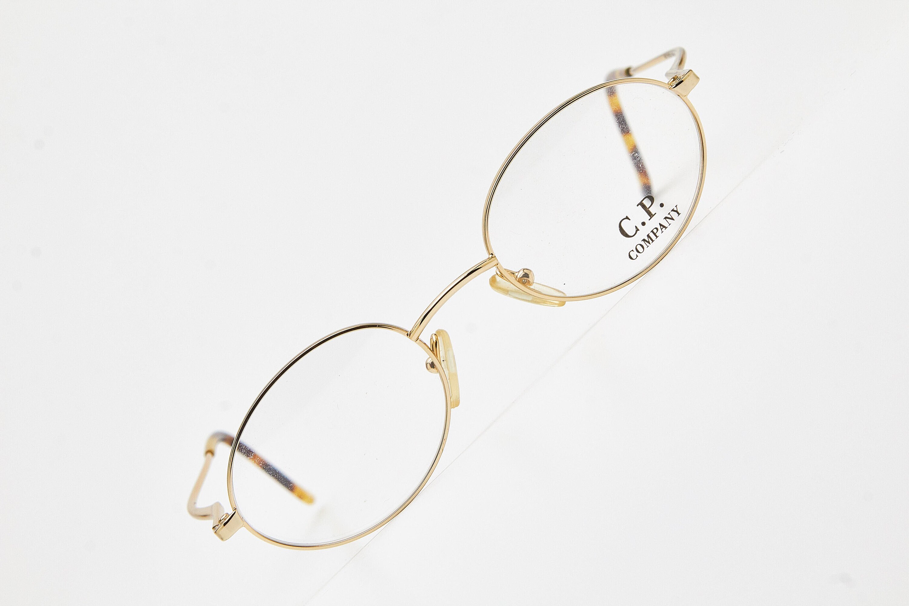 C.P. COMPANY サングラス ヴィンテージ 2000年代のヴィンテージ C.P. COMPANY 眼鏡、金色の眼鏡、楕円形