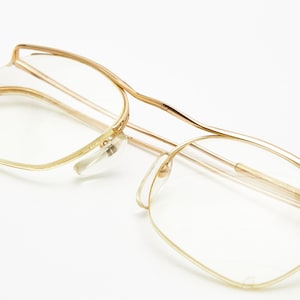 Óculos de sol banhados a ouro da década de 1960 ESSILOR França CatEye Sexy Armação de metal dourado Vintage Óculos femininos Masculinos Óculos retrô Clássicos da moda