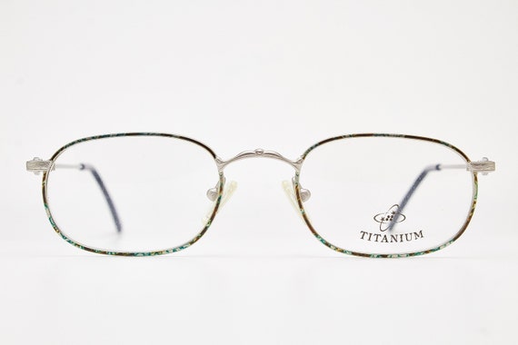 Occhiali Da Vista Uomo T61234 | Occhiali Ovali Oro In Titanio | Firmoo IT