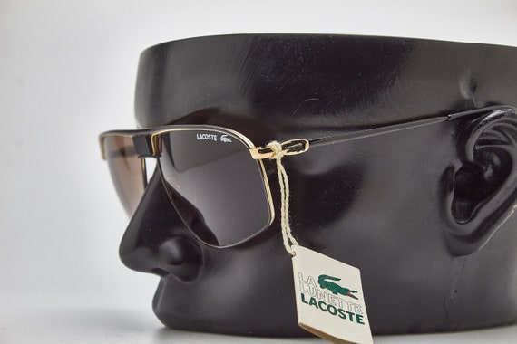 Find Lacoste-8039 Black D.C Lens To Gold Metal Frame Branded Sunglasses by  Pilanta Group near me | Sarthana Jakatnaka, Surat, Gujarat | Anar B2B  Business App