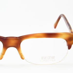 Gafas ópticas vintage IDC de media montura con montura de carey, estilo años 90.
