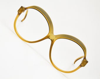 Óculos vintage PERSOL RATTI, modelo redondo borboleta cor mel – estilo hippie retrô dos anos 80.