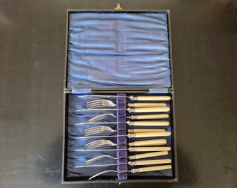 Vintage Boxed set of Faux Bone Handled Fish Cutlery