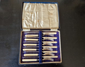 Vintage Boxed set of Faux Bone Handled Fish Cutlery