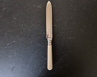 Vintage Faux Bone Handled Cake/ Bread Knife - 9.5 Inches