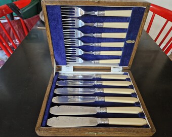 Vintage Boxed set of Faux Bone Handled Fish Cutlery