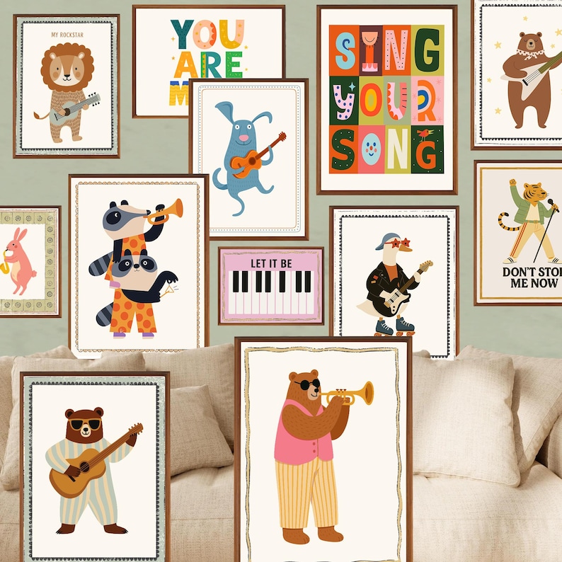 May include: A collection of framed art prints featuring whimsical animal musicians. The prints showcase a lion, dog, bear, raccoon, goose, and tiger playing instruments like guitars, trumpets, and a piano. The text "YOU ARE", "SING YOUR SONG", "LET IT BE", and "DON'T STOP ME NOW" are also displayed.