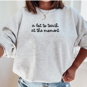 Trendy Teacher Sweatshirt Swift Concert New Teach Back to School Funny Cute Gift Elementary 2023 Concert Tour Eras A Lot Sweatshirt Teach