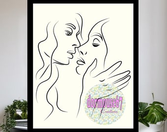 May include: Black line art print of two faces in profile, one hand gently touching the other face. The artwork is set against a cream background, framed in black. The artist's signature is visible.