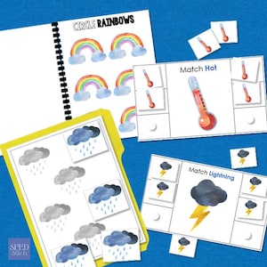 May include: Educational materials featuring weather-themed illustrations. Includes a spiral-bound book with rainbow graphics and matching cards with images of rain clouds, thermometers, and lightning bolts. The text "CIRCLE RAINBOWS" is visible.