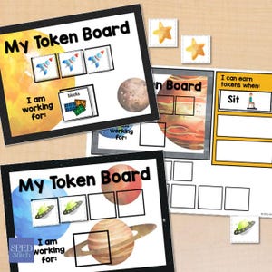 May include: Multiple "My Token Board" charts with space-themed illustrations, including planets, rockets, and UFOs. The boards have spaces for tokens and the text "I am working for:" and "I can earn tokens when: Sit".