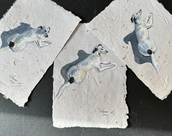 three pictures of original dogs amalvanized by hand in watercolor on a secondary paper 10x15 cm. watercolor dogs on recycled paper