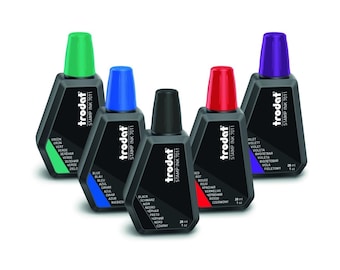 May include: Five bottles of Trodat Stamp Ink 7011 in various colors: green, blue, black, red, and purple. Each bottle has a colored cap and a black body. The bottles are labeled with the ink color in multiple languages.