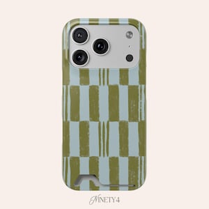 May include: A mobile phone case featuring a green and pale blue checked design. The case has a camera module with three lenses and a flash. The bottom has a cutout for a charging port. The text "Ninety4" is at the bottom.